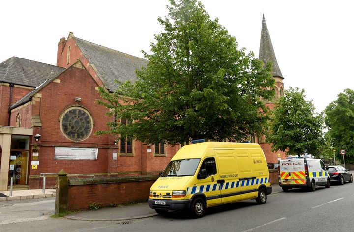 A police vehicle is parked outside Didsbury Mosque in Greater Manchester in the wake of the Manchester Arena attack.