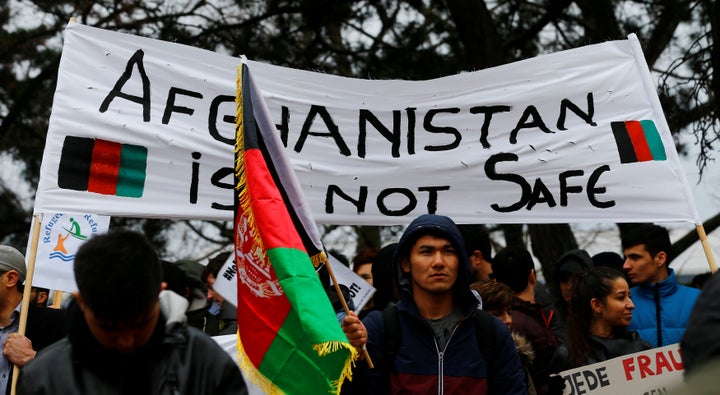 Protesters take part in a demonstration against racism and European asylum policy in Vienna, Austria, on March 18, 2017.