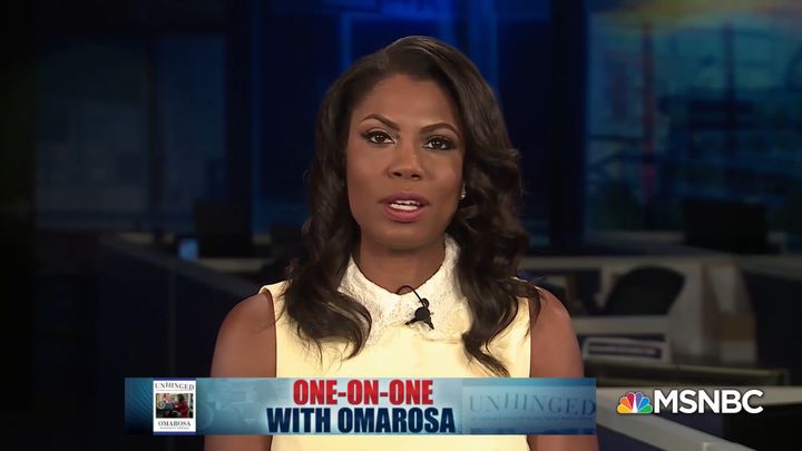 Former White House aide Omarosa Manigault-Newman on Sunday called President Donald Trump a racist who uses people as props.