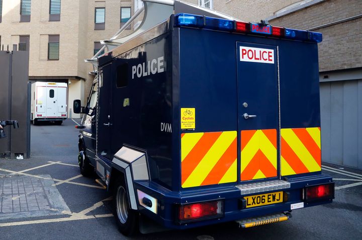 An armoured police vehicle, believed to contain Salih Khater, drives into the car park at Westminster Magistrates court in London