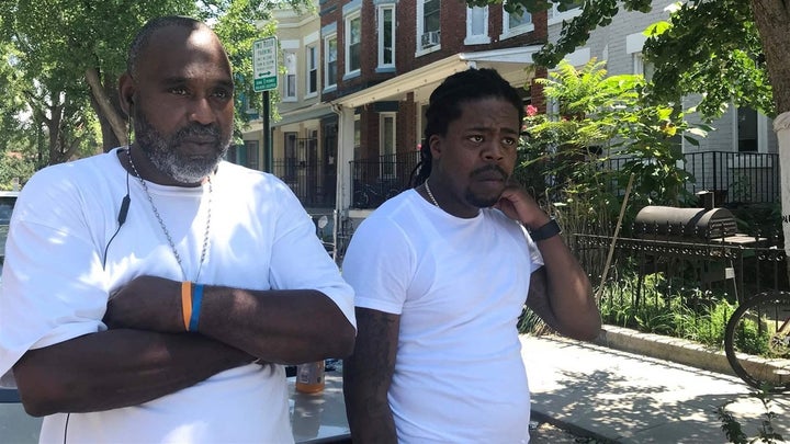 Maurice, left, and Diante, right, who did not want their last names used, talk outside the Park Morton public housing facilit