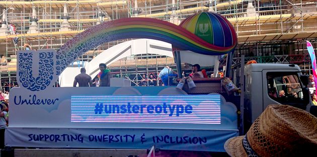 Unilever - with rainbows, drag queen, disco music and muscle man. London Pride Parade. July 7, 2018.