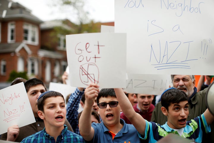 Students from Rambam Mesivta-Maimonides High School protest outside the home of Jakiw Palij in New York, U.S., April 24, 2017.