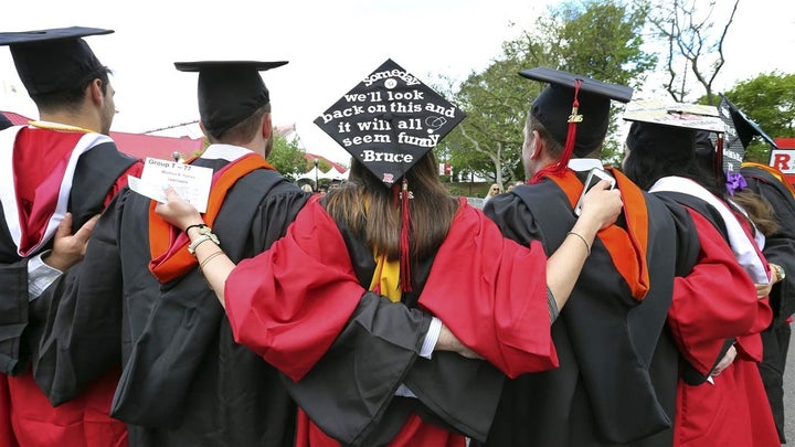 <p>Students at Rutgers graduation ceremonies in Piscataway, New Jersey. The Education Department plans to publish more debt and earnings information to help students learn about job prospects after they leave school. </p>