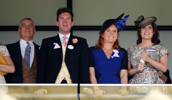 Prince Andrew, Duke of York, Jack Brooksbank, Sarah Ferguson, Duchess of York, and Princess Eugenie watch the racing as they attend the Royal Ascot at Ascot Racecourse on June 19, 2015.