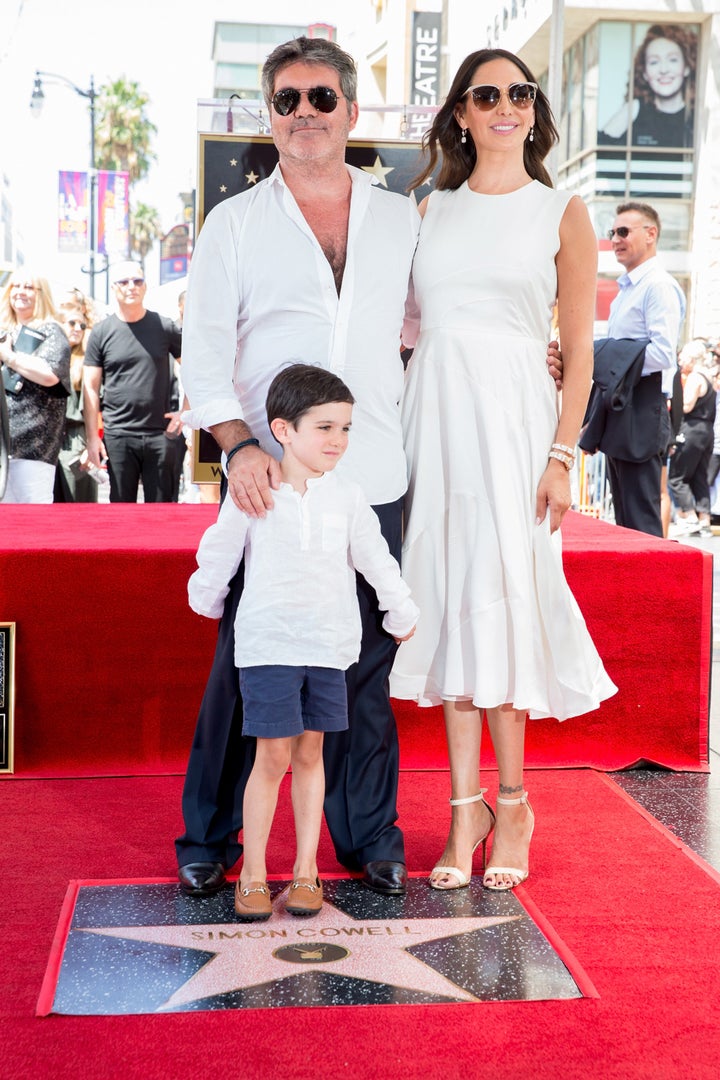 Simon with partner Lauren Silverman and son Eric