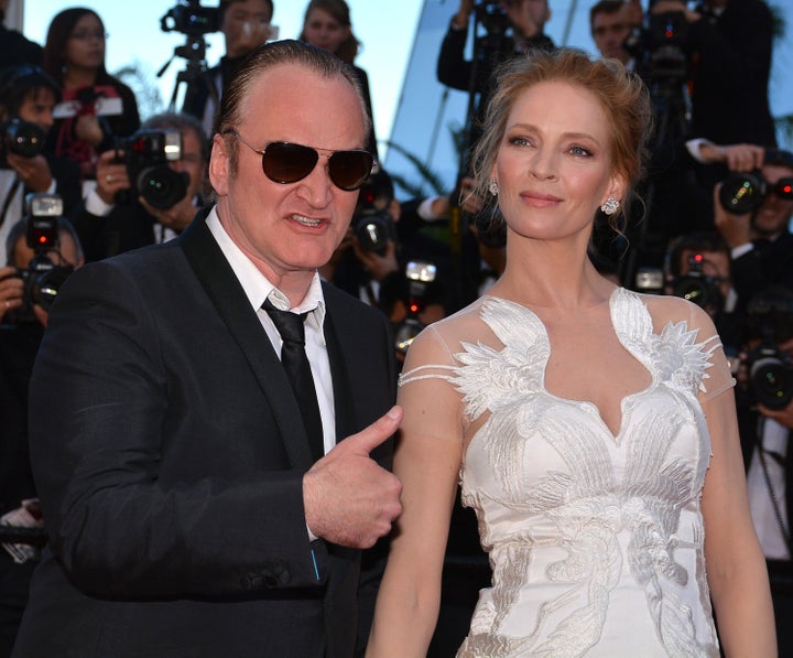 Thurman and director Quentin Tarantino at the 67th Cannes Film Festival in 2014.