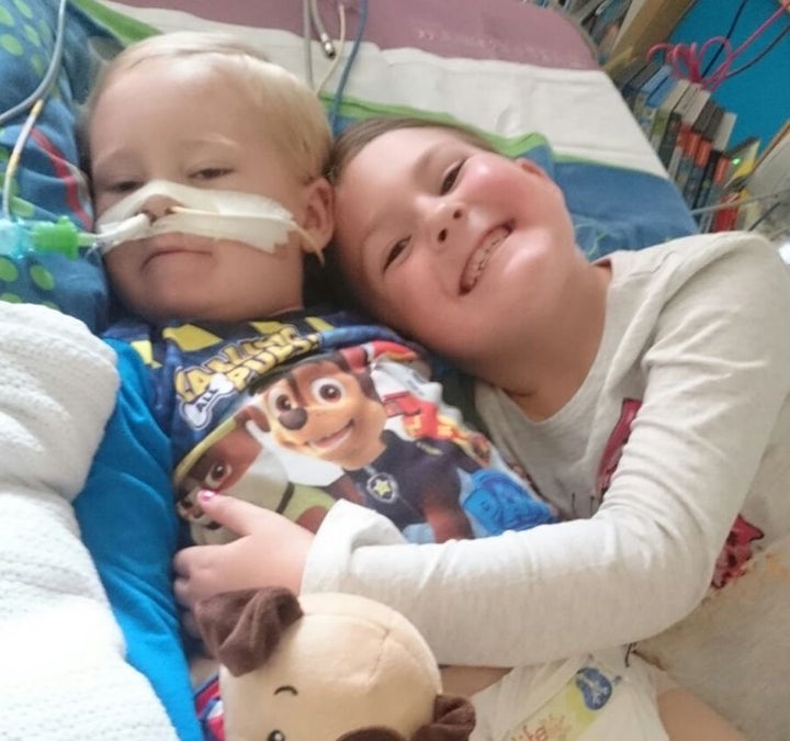 McKenzie (left) and sister Paige (right) during his time in hospital.