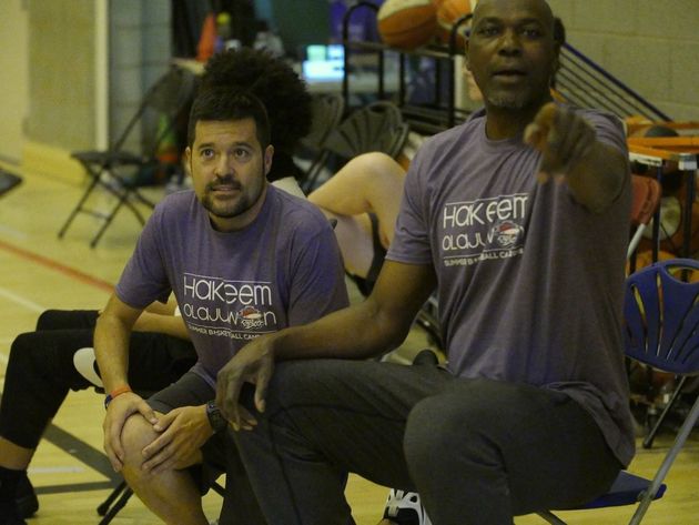 Basketball legend Hakeem Olajuwon calling the shots at his basketball camp for youths in Birmingham