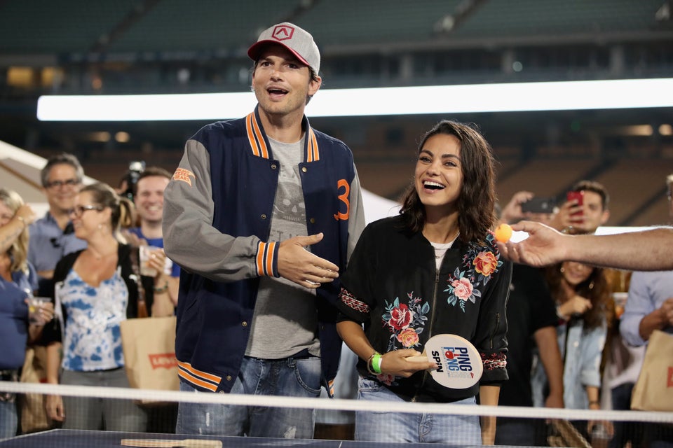 LOS ANGELES, CA - AUGUST 23:  (L-R) Ashton Kutcher and Mila Kunis play ping pong at  Clayton Kershaw's 6th Annual Ping Pong 4
