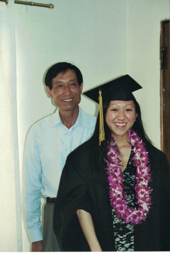 The author and her father at her college graduation.