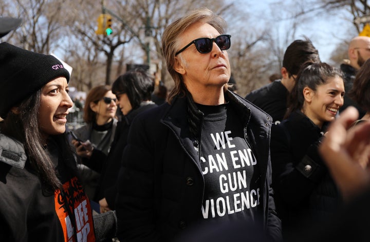 Paul McCartney joins thousands of people, many of them students, at a march against gun violence in Manhattan during the March for Our Lives rally on March 24 in New York.