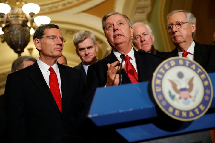 GOP Sens. John Barrasso (Wyo.), Bill Cassidy (La.) and Lindsey Graham (S.C.) — three sponsors of the new bill — with Senate Majority Leader Mitch McConnell (Ky.) and Majority Whip John Cornyn (Texas), after a failed attempt to weaken pre-existing condition protections last year.