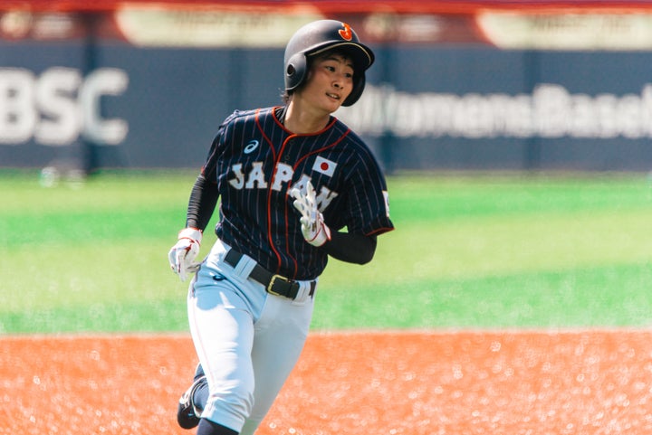 Japan's Harue Yoshi rounds the bases during the Women's Baseball World Cup in a game against Hong Kong in Viera, Florida.