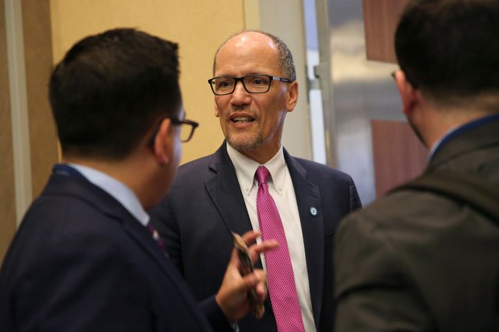 Democratic National Committee Chairman Tom Perez talks with DNC staffers following an executive committee meeting Thursday in Chicago.