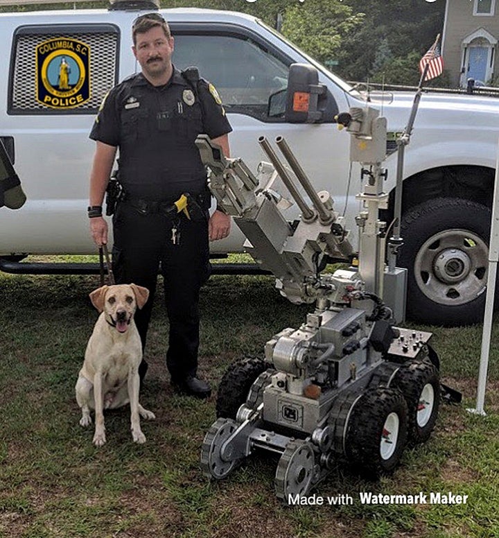 Officer David Hurt and his police dog, Turbo, in an undated photo.