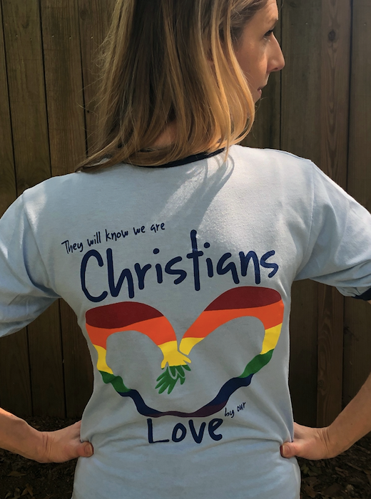 Weaver wearing a pro-LGBTQ shirt made by Shrine of the Immaculate Conception.