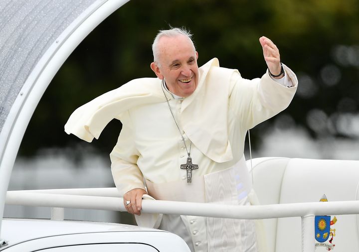 Pope Francis arrives prior to the commencement of the closing mass of his Ireland visit at the Phoenix Park in Dublin on Sunday.