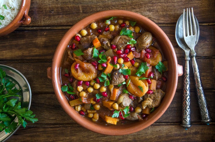 Lamb tagine with chickpeas, apricots and pomegranate seeds.