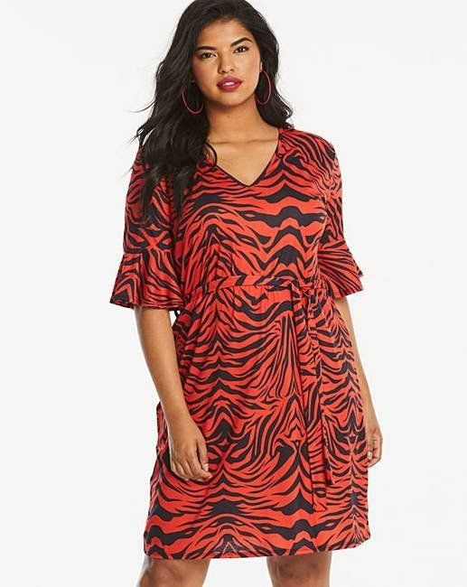 If you like to stand out, this bright red and black animal print dress will make your life easier as this dress was made for extroverts. The peplum sleeves give the entire dress a flirty feel while keeping your arms warm as there's nothing cute about freezing in the winter. (<a href="https://www.simplybe.co.uk/shop/pinkclove-animal-print-wrap-dress/gt087/product/details/show.action?pdBoUid=8015#colour:Red/Black,size:" target="_blank" rel="noopener noreferrer">Simply Be</a>, size 16-28 available, &pound;24)