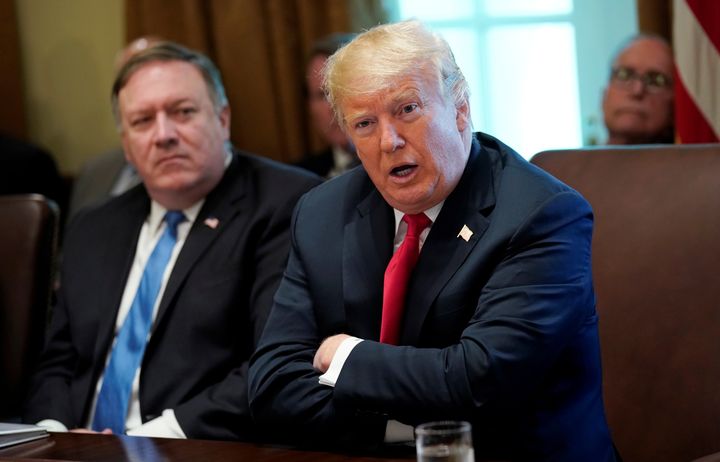 The decision to kill the rescission looks like a win for Secretary of State Mike Pompeo (left) and his department.