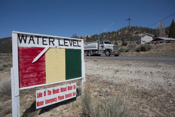 A groundwater-level sign in Los Padres National Forest on May 7, 2015, near Frazier Park, California. By 2050, water supply from snowpack in the state is expected to decrease by two-thirds, according to the climate assessment.