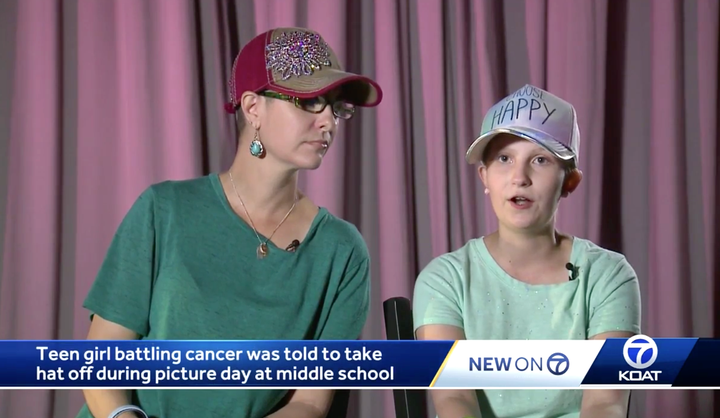 Bella Thurston, right, was wearing a hat because some of her hair has fallen out after recent chemotherapy treatments.
