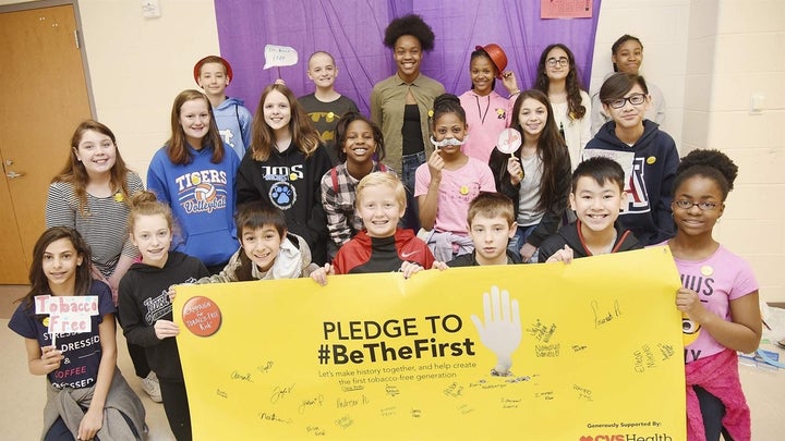 Students at Jamestown Middle School in North Carolina hold an event in March to encourage kids to stay tobacco-free. Advocates say raising the smoking age to 21 will help keep tobacco products out of middle schools and high schools, and hundreds of cities and counties are taking action. 