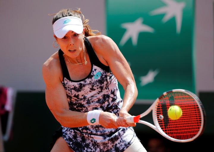 A U.S. Open chair umpire faced criticism for being sexist after he gave French tennis player Alizé Cornet, pictured here at the French Open in May, a code violation for changing her shirt on court.