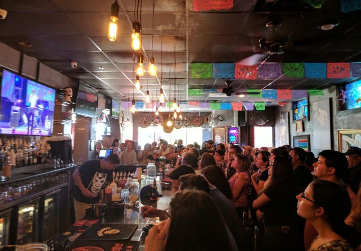 An overflow crowd watches Beto O'Rourke make a campaign speech in McAllen, Texas, on Aug. 18, 2018.