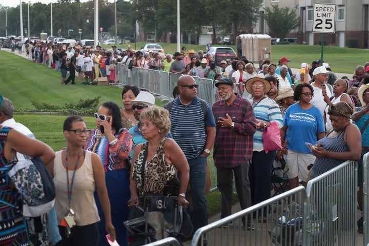 Fans of Aretha Franklin attend a viewing for the soul music legend at the Charles H. Wright Museum of African-American History on Aug. 28, 2018, in Detroit, Michigan.