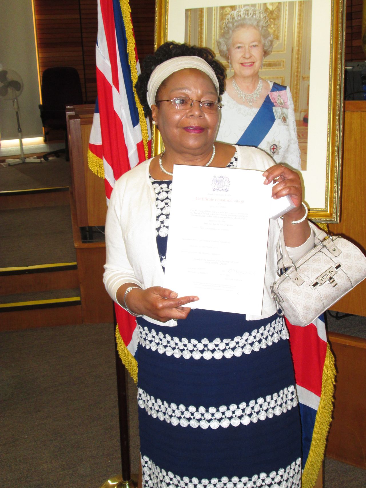 Sherry, receiving her British citizenship on Tuesday