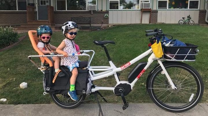 Morgan Lommele, a campaigns manager for the Bicycle Product Suppliers Association and the PeopleForBikes Coalition, uses an electric bike to transport her two kids, Lael (left), age 2, and Eli, age 3, to daycare. She then rides to work, about 10 miles a day. 