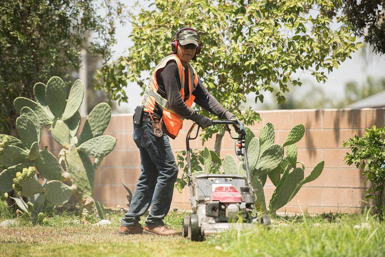 Raudel Felix García thinks about how the heat affects him and his landscaping crew on a daily basis. He wears long sleeves and a hat to protect himself from the sun, drinks plenty of water (sometimes upwards of 15 to 20 16 oz. bottles a day), and takes frequent breaks when temperatures are soaring over 100 degrees.