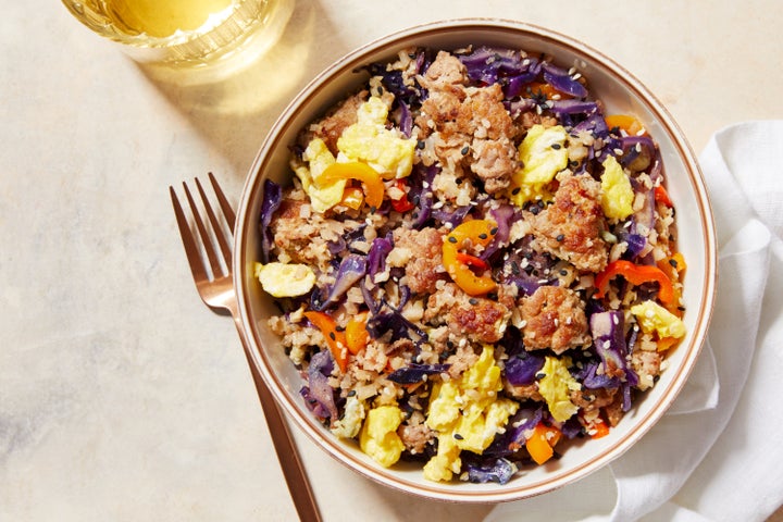 A unique Whole30-approved Blue Apron recipe of pork fried cauliflower rice with cabbage and sweet peppers.