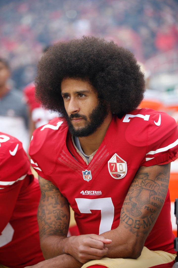 Kaepernick kneels on the sideline during the anthem prior to a game against the New York Jets at Levi on December 11, 2016.