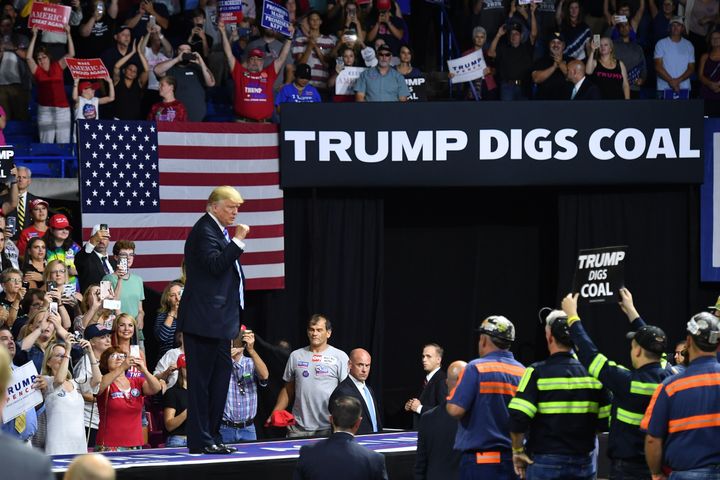 President Donald Trump at a political rally in Charleston, West Virginia, on Aug. 21. His administration announced a plan to weaken environmental regulations on coal plants.