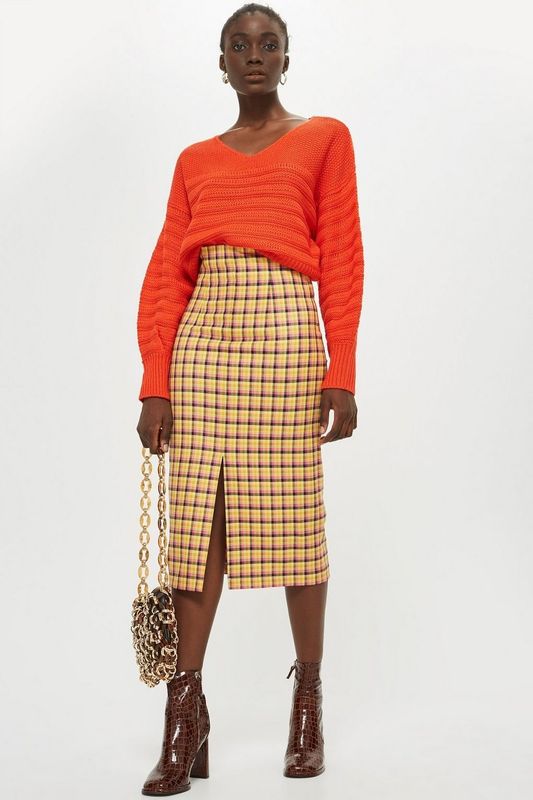 Check Midi Skirt, sizes 4-16 available, £39, <a href="http://www.topshop.com/en/tsuk/product/check-midi-skirt-7875735?Ntt=midi%20skirt" target="_blank" rel="noopener noreferrer">Topshop</a>.