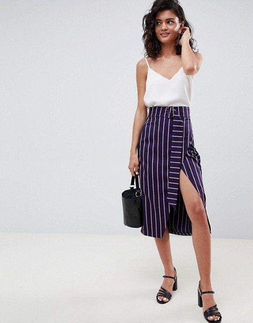 Tailored Wrap Midi Skirt In Stripe, sizes 6-18 available, £35, <a href="http://www.asos.com/asos-design/asos-design-tailored-wrap-midi-skirt-in-stripe/prd/9938606?clr=stripe&SearchQuery=midi%20skirt&gridcolumn=2&gridrow=11&gridsize=4&pge=1&pgesize=72&totalstyles=761" target="_blank" rel="noopener noreferrer">ASOS</a>. 