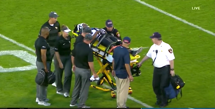 Medics tended to Aaron Robinson for nine minutes before he was carted off the field.