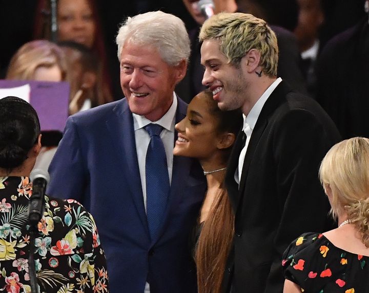 Bill Clinton takes a picture with Ariana Grande and her fiancé, Pete Davidson, at Aretha Franklin's funeral.