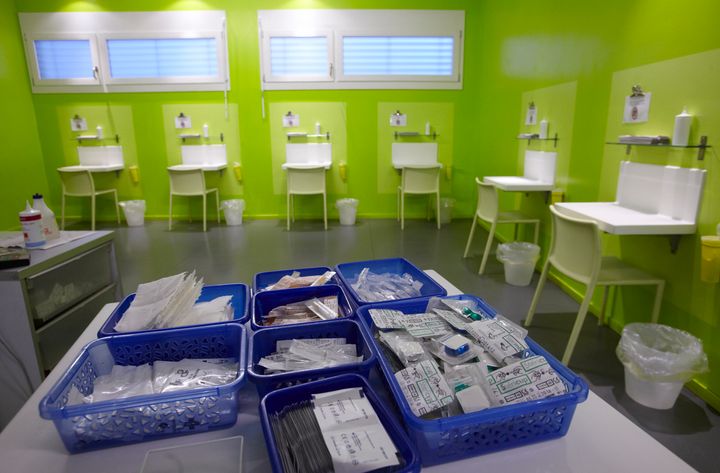Kits of supplies containing syringes, bandages and antiseptic pads inside a safe injection site in Switzerland.