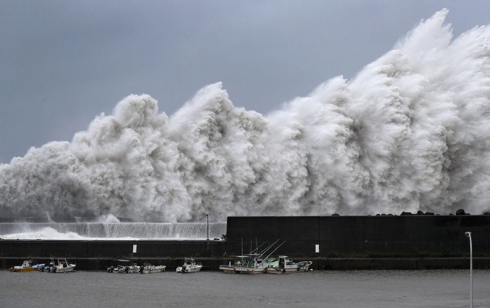 High waves triggered by Typhoon Jebi are seen at a fishing port in Aki, Kochi Prefecture, western Japan.