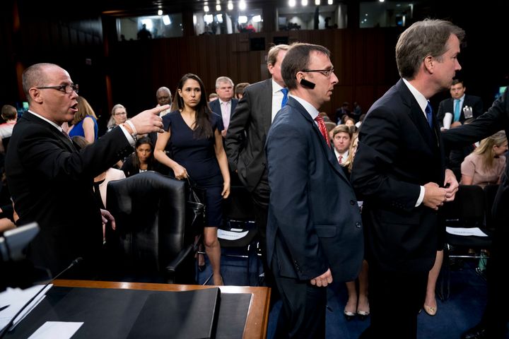 Guttenberg speaks as Kavanaugh moves away from him after rebuffing Guttenberg's attempt at a handshake.