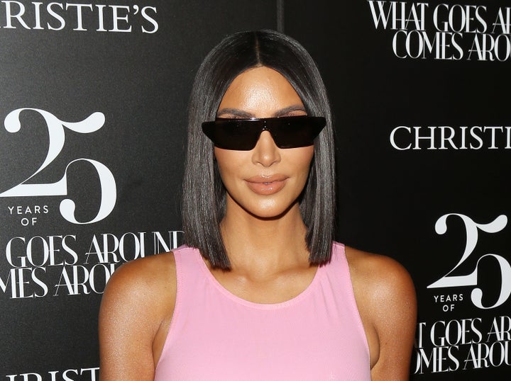 Kim Kardashian and her sunglasses attend the What Goes Around Comes Around 25th Anniversary Auction in Beverly Hills on Aug. 21.