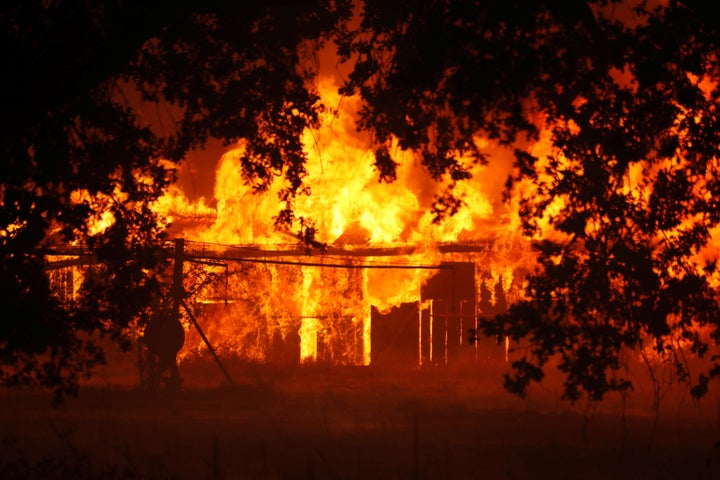 An out-of-control fire burns in Lakeport, California. Events like 2018's California wildfires could become average.