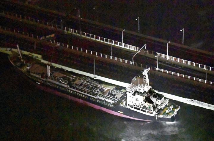 The 2,591-tonne tanker slammed into the bridge in the night