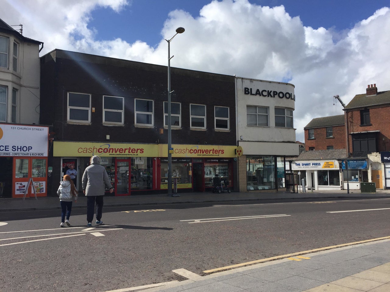 A pawnbrokers occupies a double front on a shopping parade in central Blackpool.