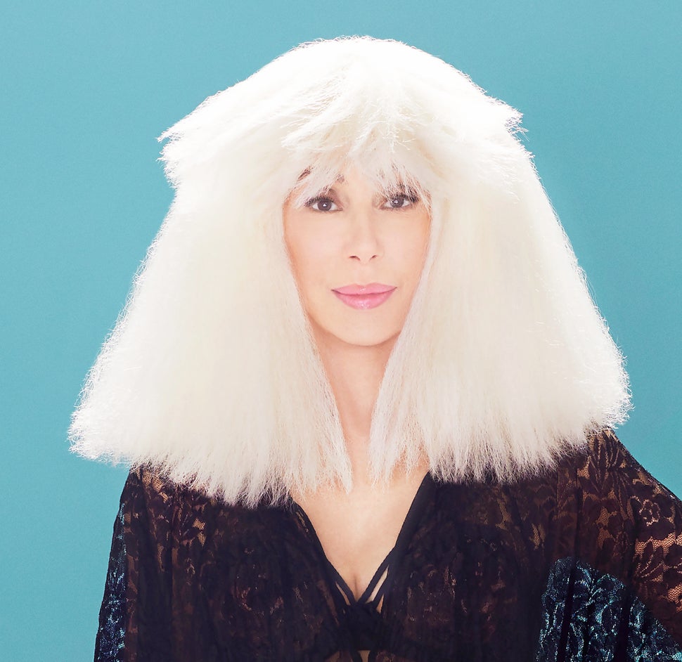Cher, in a promotional image for "Dancing Queen."