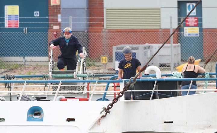 <strong>Members of the crew on board Honeybourne III, a Scottish scallop dredger, whilst in dock at Shoreham, West Sussex, following clashes with French fishermen </strong>